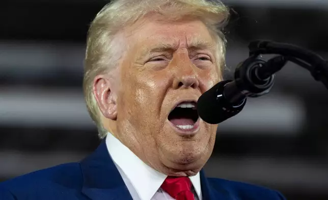 President Donald Trump speaks on his first 100 days at Macomb County Community College Sports Expo Center, Tuesday, April 29, 2025, in Warren, Mich. (AP Photo/Alex Brandon)