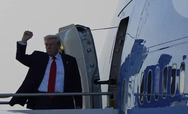 President Donald Trump waves as he departs on Air Force One from Selfridge Air National Guard Base, Tuesday, April 29, 2025, in Harrison Township, Mich. (AP Photo/Alex Brandon)