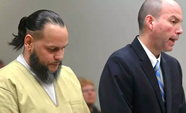 Public defender Christopher Eddy, right, speaks for his client Alex Oyola-Sanchez during Oyola-Sanchez's sentencing at state Superior Court in New Britain, Conn., April 29, 2025. (Jim Michaud/Hearst Connecticut Media via AP)