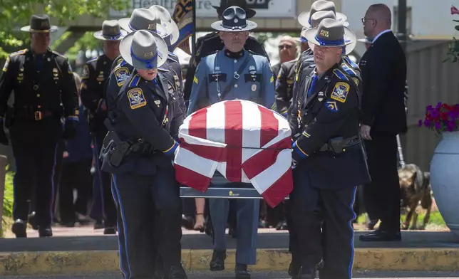 FILE - Connecticut state trooper Aaron Pelletier's casket is carried out of Xfinity Theater after his funeral in Hartford, Conn., June 5, 2024. (Aaron Flaum /Hartford Courant via AP, File)