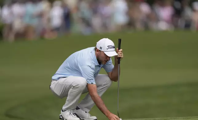 Russell Henley lines up a putt on the 16th green during the second round of the RBC Heritage golf tournament, Friday, April 18, 2025, in Hilton Head Island, S.C. (AP Photo/Mike Stewart)