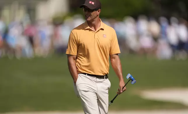 Adam Scott walks on the 16th green during the second round of the RBC Heritage golf tournament, Friday, April 18, 2025, in Hilton Head Island, S.C. (AP Photo/Mike Stewart)