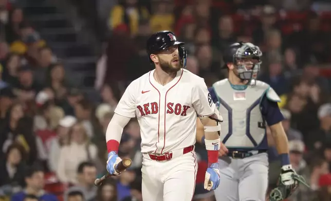 Boston Red Sox's Triston Casas watches as his ball flies over center field for a three-run home run during the seventh inning of a baseball game against the Seattle Mariners, Tuesday, April 22, 2025, in Boston. (AP Photo/Mark Stockwell)