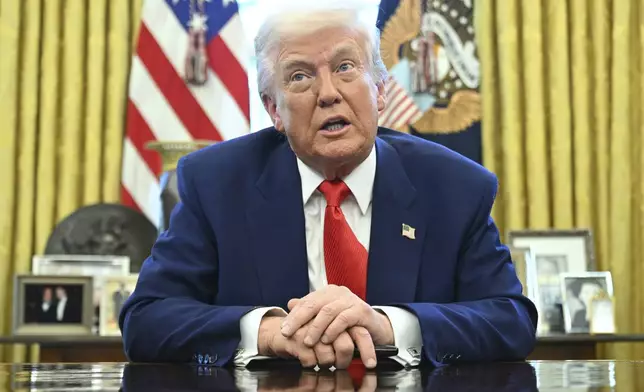 President Donald Trump speaks after signing an executive order in the Oval Office of the White House Wednesday, April 9, 2025, in Washington. (Pool via AP)