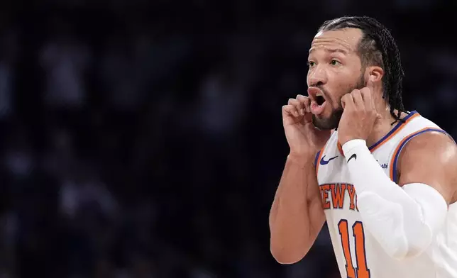 New York Knicks guard Jalen Brunson reacts during the second half of Game 1 in an NBA basketball first-round playoff series against the Detroit Pistons, Saturday, April 19, 2025, in New York. (AP Photo/Julia Demaree Nikhinson)