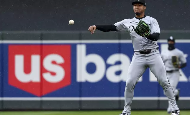 Chicago White Sox second baseman Lenyn Sosa (50) throws the ball during the sixth inning of a baseball game against the Minnesota Twins Thursday, April 24, 2025, in Minneapolis, Minn. (AP Photo/Ellen Schmidt)