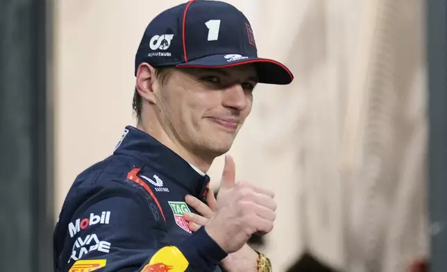 Red Bull driver Max Verstappen of the Netherlands thumbs up after setting the pole position in the qualifying session ahead of the Formula One Saudi Arabian Grand Prix at the Jeddah Corniche Circuit in Jeddah, Saudi Arabia, Saturday, April 19, 2025. (AP Photo/Darko Bandic)