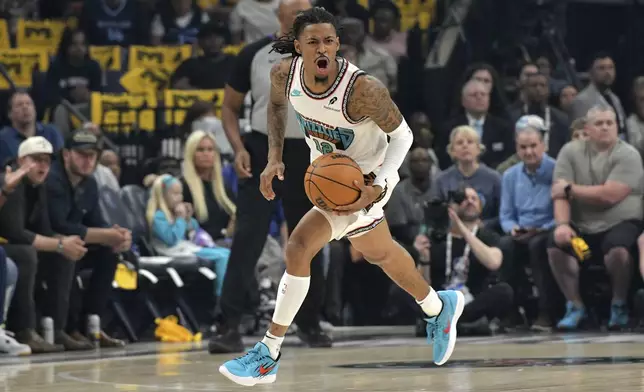 Memphis Grizzlies guard Ja Morant (12) reacts in the first half of Game 3 of an NBA first-round playoff series against the Oklahoma City Thunder, Thursday, April 24, 2025, in Memphis, Tenn. (AP Photo/Brandon Dill)