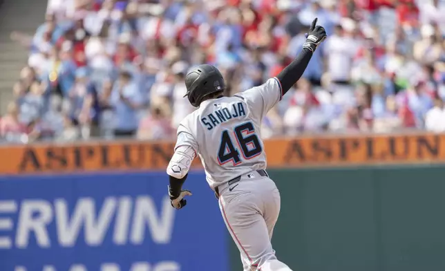 Miami Marlins' Javier Sanoja rounds the bases after hitting a three run home run in the eighth inning of a baseball game against the Philadelphia Phillies, Sunday, April 20, 2025, in Philadelphia. (AP Photo/Laurence Kesterson)
