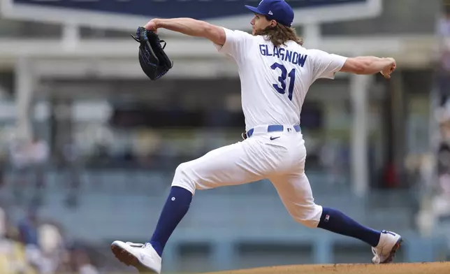 Los Angeles Dodgers pitcher Tyler Glasnow throws to a Pittsburgh Pirates batter during the first inning of a baseball game against the Pittsburgh Pirates in Los Angeles, Sunday, April 27, 2025. (AP Photo/Jessie Alcheh)