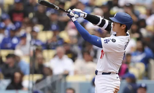 Los Angeles Dodgers designated hitter Shohei Ohtani prepares to bat during the second inning of a baseball game against the Pittsburgh Pirates in Los Angeles, Sunday, April 27, 2025. (AP Photo/Jessie Alcheh)