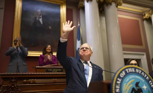 Minnesota Gov. Tim Walz acknowledges the applause of the House chamber before he delivers his State of the State address before a joint session of the Legislature at the state Capitol in St. Paul, Minn., Wednesday, April 23, 2025. (Jeff Wheeler/Star Tribune via AP)