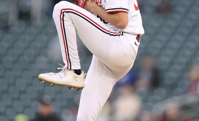 Minnesota Twins starting pitcher David Festa (58) winds up to deliver during the second inning of a baseball game against the Chicago White Sox, Wednesday, April 23, 2025, in Minneapolis. (AP Photo/Abbie Parr)