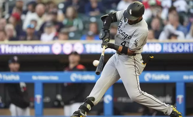 Chicago White Sox's Joshua Palacios (47) hits a single during the third inning of a baseball game against the Minnesota Twins, Wednesday, April 23, 2025, in Minneapolis. (AP Photo/Abbie Parr)