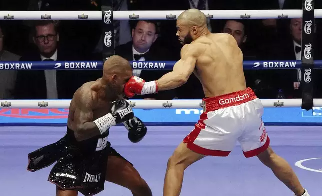 Chris Eubank Jr., right, lands a punch on Conor Benn during their middleweight bout at Tottenham Hotspur Stadium, London, Saturday, April 26, 2025. (Bradley Collyer/PA via AP)