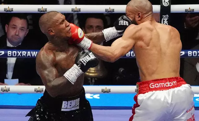 Conor Benn, left, and Chris Eubank Jr. fight during their middleweight bout at Tottenham Hotspur Stadium, London, Saturday, April 26, 2025. (Bradley Collyer/PA via AP)