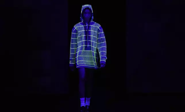 A model wears a creation from Alexandre Herchcovitch collection during Sao Paulo Fashion Week in Sao Paulo, Monday, April 7, 2025. (AP Photo/Andre Penner)