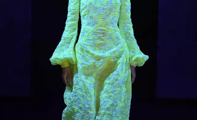 A model wears a creation from the Alexandre Herchcovitch collection during Sao Paulo Fashion Week in Sao Paulo, Monday, April 7, 2025. (AP Photo/Andre Penner)