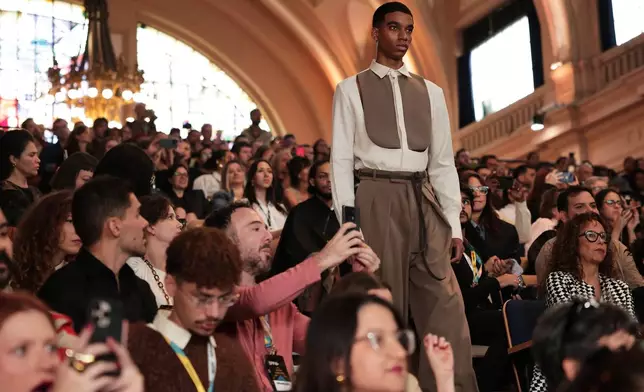 A model wears a creation from the Joao Pimenta collection during Sao Paulo Fashion Week, Thursday, April 10, 2025. (AP Photo/Ettore Chiereguini)