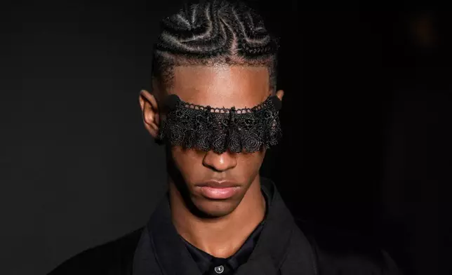 A model wears a creation from the Leandro Castro collection at Sao Paulo Fashion Week, Tuesday, April 8, 2025. (AP Photo/Andre Penner)