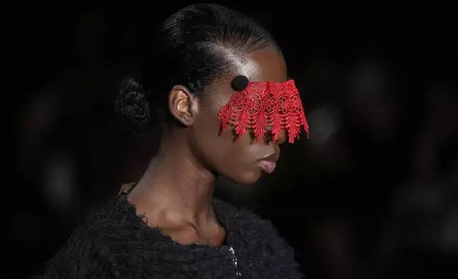 A model wears a creation from the Leandro Castro collection at Sao Paulo Fashion Week, Tuesday, April 8, 2025. (AP Photo/Andre Penner)