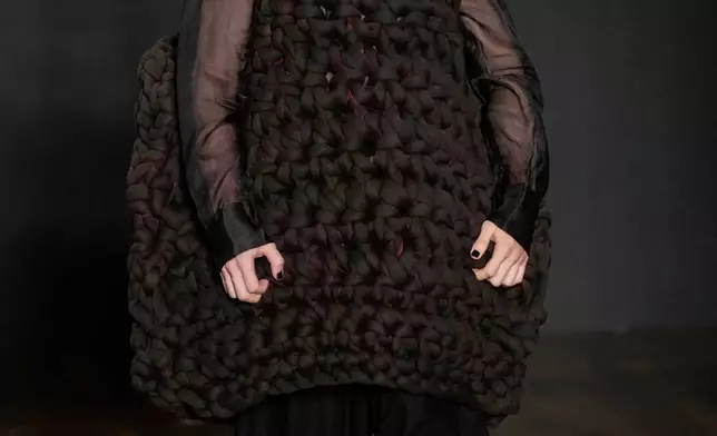 A model wears a creation from Leandro Castro collection during Sao Paulo Fashion Week, Tuesday, April 8, 2025. (AP Photo/Andre Penner)