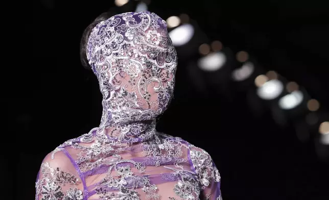 A model wears a creations from the Walerio Araujo collection during Sao Paulo Fashion Week, Thursday, April 10, 2025. (AP Photo/Ettore Chiereguini)