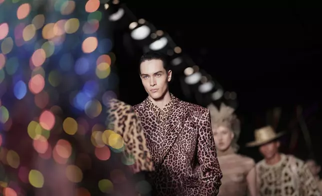 Models wear creations from the Walerio Araujo collection during Sao Paulo Fashion Week, Thursday, April 10, 2025. (AP Photo/Ettore Chiereguini)