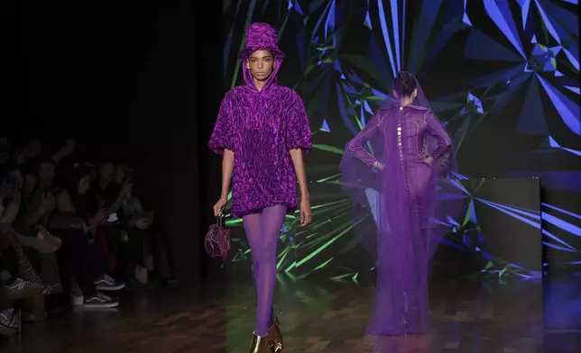 Models wear creations from the Walerio Araujo collection during Sao Paulo Fashion Week, Thursday, April 10, 2025. (AP Photo/Ettore Chiereguini)
