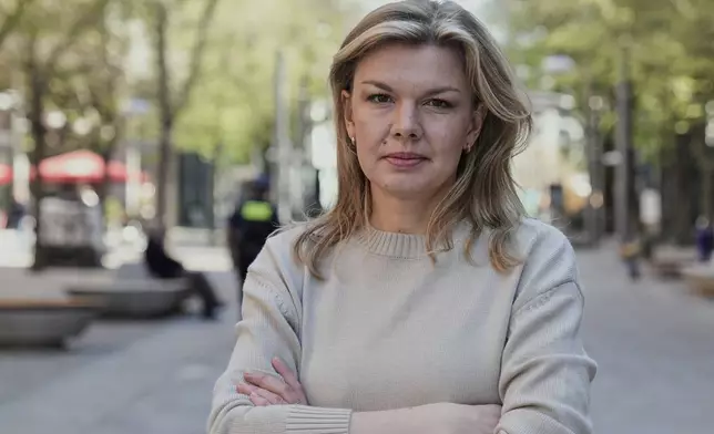 Ksenia Lutskina, a Belarusian journalist who was imprisoned in Belarus for several years and left the country after her release, poses for a photo in Berlin, Germany, on April 15, 2025. (AP Photo/Ebrahim Noroozi)