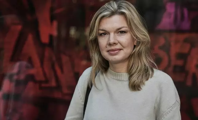 Ksenia Lutskina, a Belarusian journalist who was imprisoned in Belarus for several years and left the country after her release, poses for a photo in Berlin, Germany, on April 15, 2025. (AP Photo/Ebrahim Noroozi)