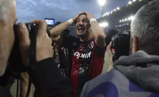 Bologna's Riccardo Orsolini celebrates after scoring the goal 1-0 during the Serie A soccer match between Bologna F.C. and F.C. Internazionale Milano at Renato Dall'Ara Stadium, Bologna, Italy, Sunday, April 20, 2025. (Michele Nucci/LaPresse via AP)
