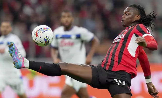 AC Milan's Rafael Leao in action during the Serie A soccer match between Milan and Atalanta at San Siro Stadium in Milan, Italy, Sunday April 20, 2025. (Spada/LaPresse via AP)