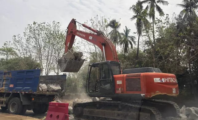 Rescuers clean debris from damaged roads in the aftermath of the March 28 earthquake in Naypyitaw, Myanmar, Thursday, April 10, 2025. (AP Photo)