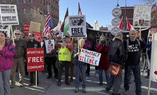 Protesters gather outside federal court ahead of a hearing for Mohsen Mahdawi, a Palestinian man arrested at a Vermont immigration office during an interview about finalizing his U.S. citizenship and a legal permanent resident who led protests against the war in Gaza at Columbia University, Wednesday, April 23, 2025 in Burlington, Vt. (AP Photo/Amanda Swinhart)