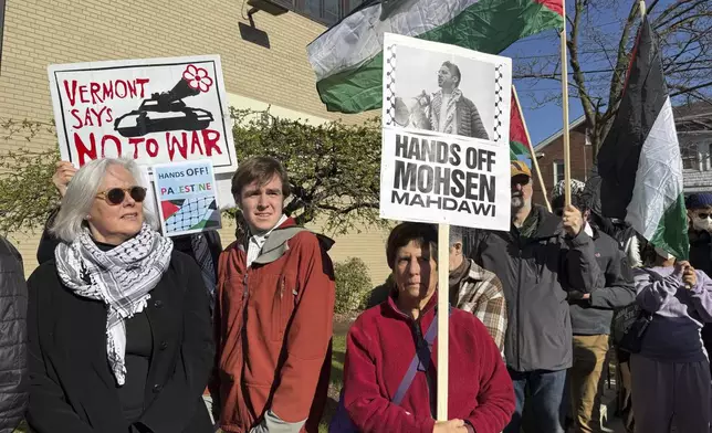 Protesters gather outside federal court ahead of a hearing for Mohsen Mahdawi, a Palestinian man arrested at a Vermont immigration office during an interview about finalizing his U.S. citizenship and a legal permanent resident who led protests against the war in Gaza at Columbia University, Wednesday, April 23, 2025 in Burlington, Vt. (AP Photo/Amanda Swinhart)