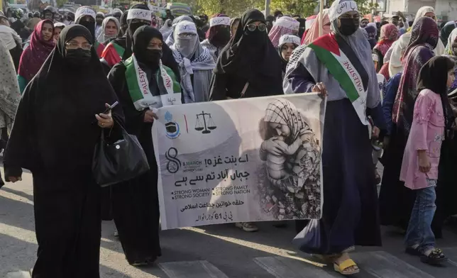 Supporters of the Pakistani religious group "Jamaat-e-Islami" take part in a rally against Israeli airstrikes and to show solidarity with Palestinian people living in Gaza, in Lahore, Pakistan Friday, April 11, 2025. (AP Photo/K.M. Chaudary)