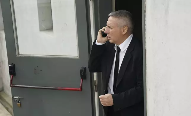 Victor Stinfale, former friend and lawyer of the late soccer star Diego Maradona, leaves court in San Isidro, on the outskirts of Buenos Aires, Argentina, Tuesday, April 15, 2025, after speaking at a trial of the medical team that treated Maradona which face charges of homicide by negligence. (AP Photo/Emmanuel Fernandez)