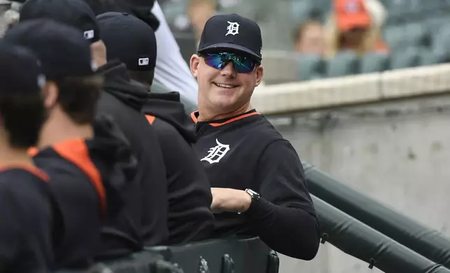 Detroit Tigers manager A.J. Hinch smiles in the dugout before a baseball game against the Kansas City Royals, Saturday, April 19, 2025, in Detroit. (AP Photo/Jose Juarez)