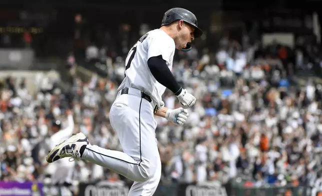 Detroit Tigers' Spencer Torkelson reacts after hitting a three-run home run off Kansas City Royals starting pitcher Seth Lugo during the fifth inning of a baseball game, Saturday, April 19, 2025, in Detroit. (AP Photo/Jose Juarez)