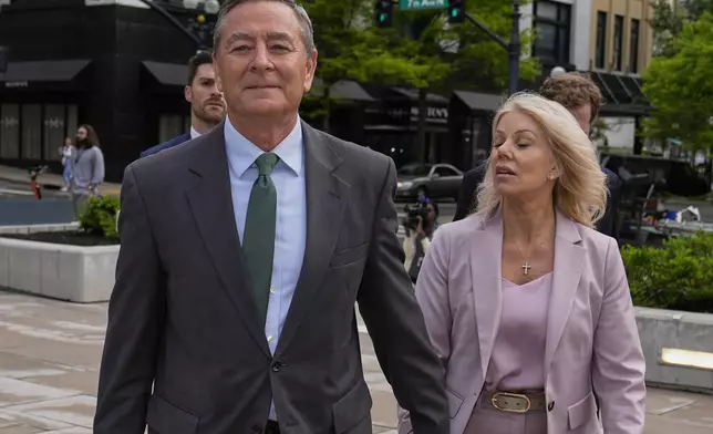 Former Tennessee House Speaker Glen Casada, center, arrives at the federal courthouse Tuesday, April 22, 2025, in Nashville, Tenn. (AP Photo/George Walker IV)