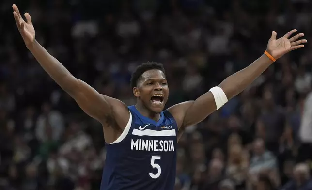 Minnesota Timberwolves guard Anthony Edwards (5) reacts during the second half of an NBA basketball game against the Utah Jazz, Sunday, April 13, 2025, in Minneapolis. (AP Photo/Abbie Parr)