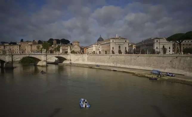 Italian Police patrol the Tiber river ahead of Saturday's funeral of Pope Francis at the Vatican, Friday, April 25, 2025. (AP Photo/Andrew Medichini)