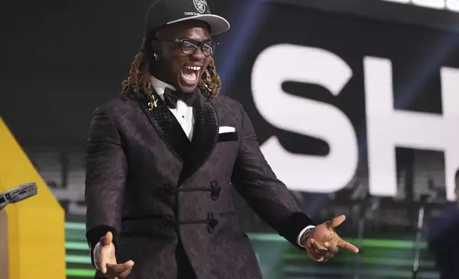 Boise State running back Ashton Jeanty celebrates after being chosen by the Las Vegas Raiders with the sixth overall pick during the first round of the NFL football draft, Thursday, April 24, 2025, in Green Bay, Wis. (AP Photo/Jeff Roberson)