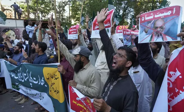 Supporters of the Pakistan Murkazi Muslim League party chants slogans during a demonstration against the suspension of water-sharing treaty by India with Pakistan, in Karachi, Pakistan Thursday, April 24, 2025. (AP Photo/Fareed Khan)
