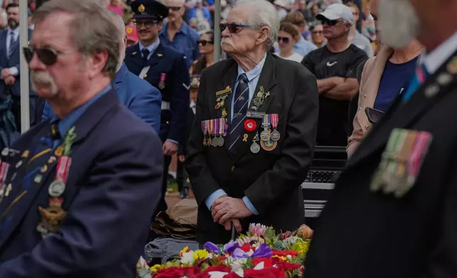 Veterans reacts during the Anzac Day commemorations in Nelson Bay, Australia, Friday, April 25, 2025. (AP Photo/Mark Baker)