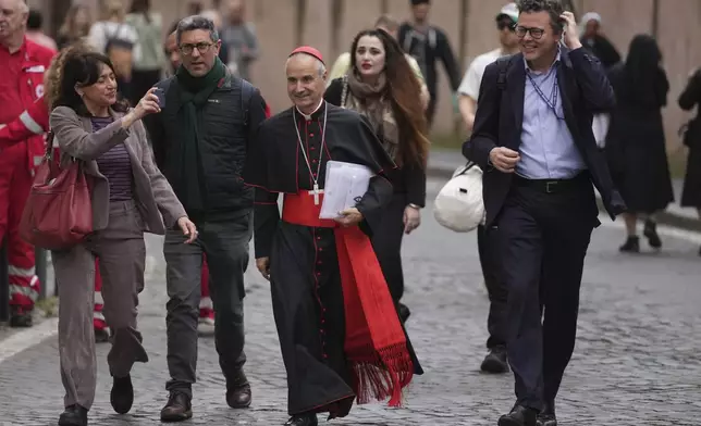 Cardinal Jean-Paul Vesco arrives for a college of cardinals' meeting at the Vatican, Thursday, April 24, 2025. (AP Photo/Andrew Medichini)
