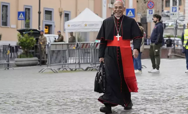 Cardinal Filipe Neri Ferrão, Archbishop of Goa and Damão, arrives for a college of cardinals' meeting, at the Vatican, Monday, April 28, 2025. (AP Photo/Gregorio Borgia)