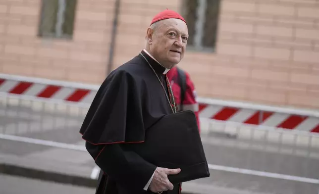 Cardinal Gianfranco Ravasi arrives for a college of cardinals' meeting at the Vatican, Thursday, April 24, 2025. (AP Photo/Markus Schrieber)