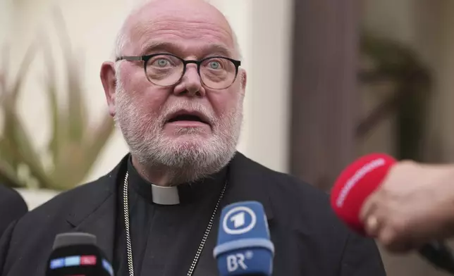 Cardinal Reinhardt Marx speaks during a press conference at the German Dioceses Union headquarters in Rome, hours after the solemn funerals for late Pope Francis at the Vatican, Saturday, April 26, 2025. (AP Photo/Domenico Stinellis)